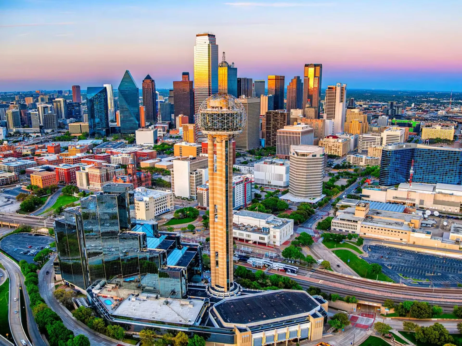 Dallas skyline with Reunion Tower at dusk, a core Sun Belt market for VDB Asset Management's Core and Core-Plus multifamily acquisitions.